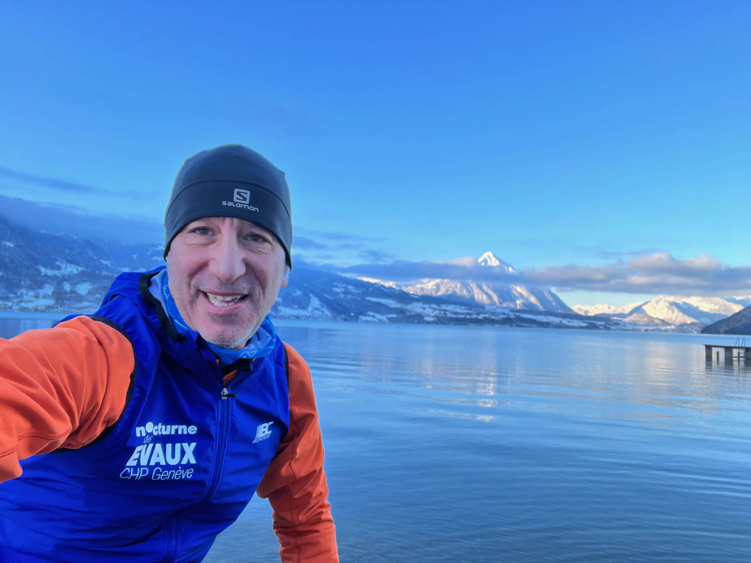 Emmanuel Colussi running beside Lake Geneva